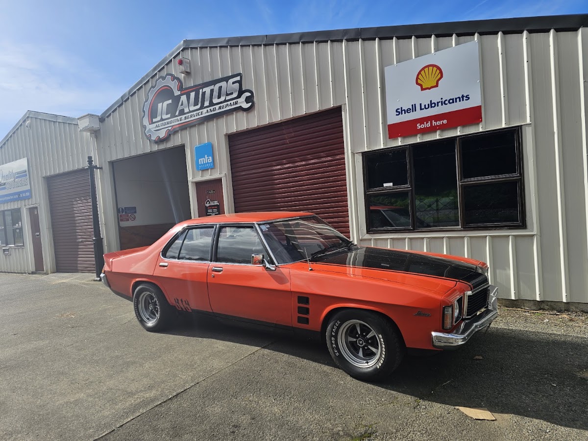 Classic Holden parked outside JC Autos